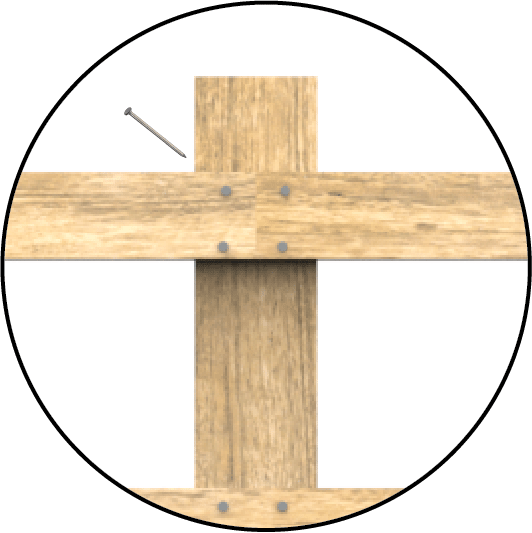 A wood cross with nails in the centre