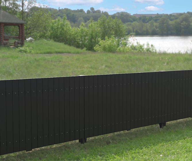 Recycled Plastic Closed Board Fencing installed around riverside
