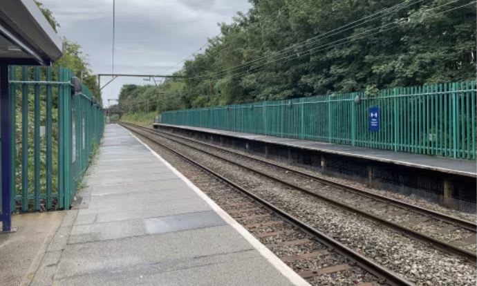 GRP Palisade fencing installed at a train station