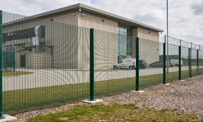 358 prison mesh fencing installed outside a shipping facility