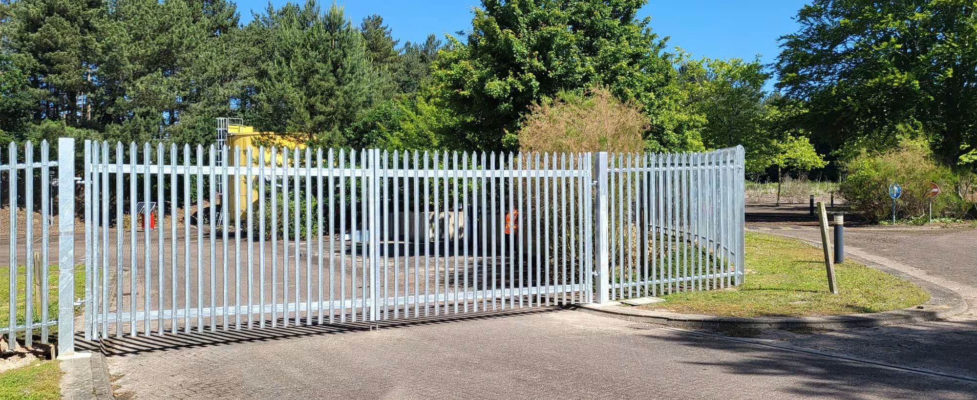 Palisade fencing and gates installed outside a business