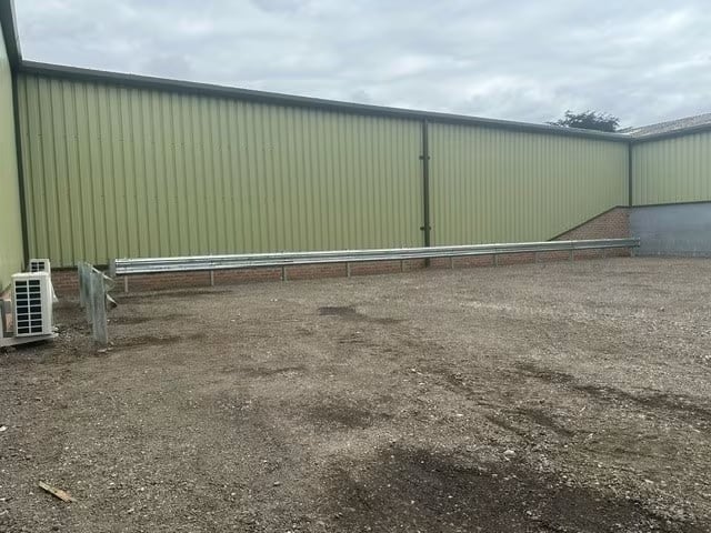 Armco safety barriers installed at a business