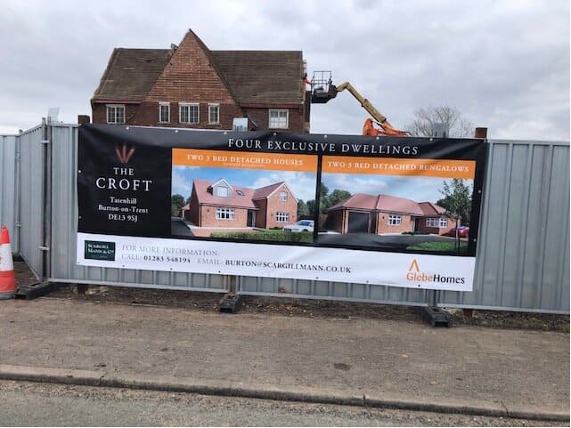 Steel hoarding installed around new build hosuing estate