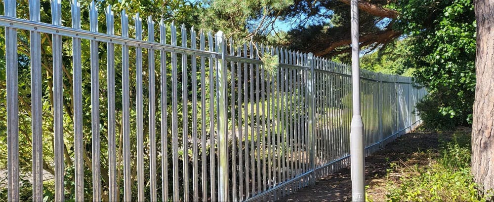 Palisade Fencing Installed along a public Path