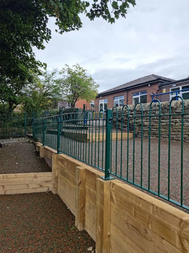 Metal Bow Top Railings Around a School