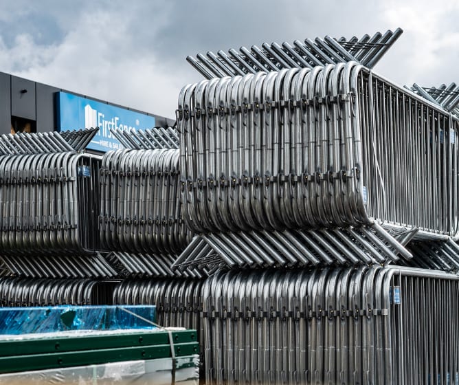 A stack of crowd control barriers