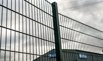 Mesh fencing installed outside warehouse
