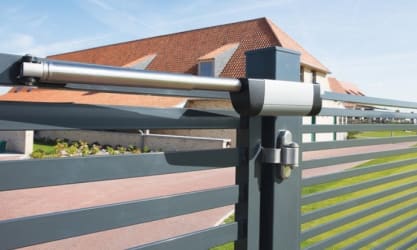 Gate with locinox closer installed at a domestic property
