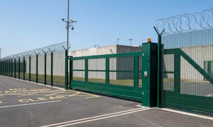 LPS 1175 cantilever gate installed in front of a high security facility