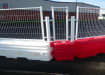 rb22 red and white crash barrier bend section with mesh panel