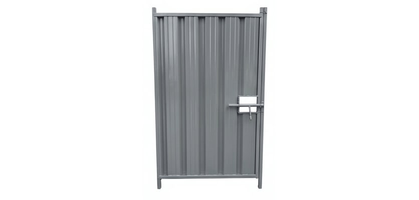 Grey steel hoarding pedestrian gate
