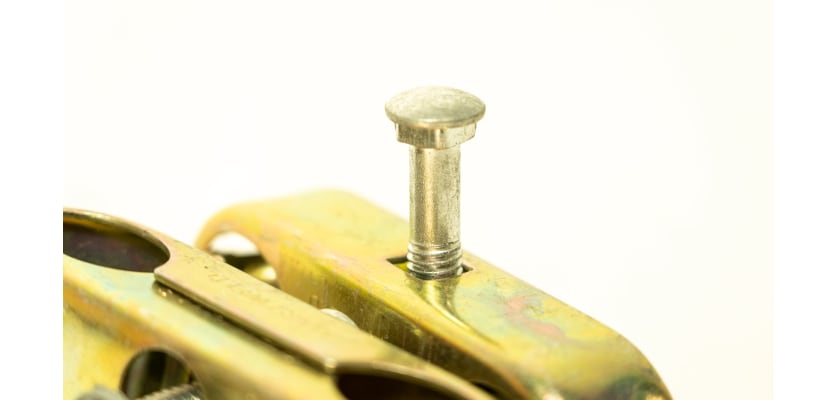 Close up of anti tamper coupler bolt 