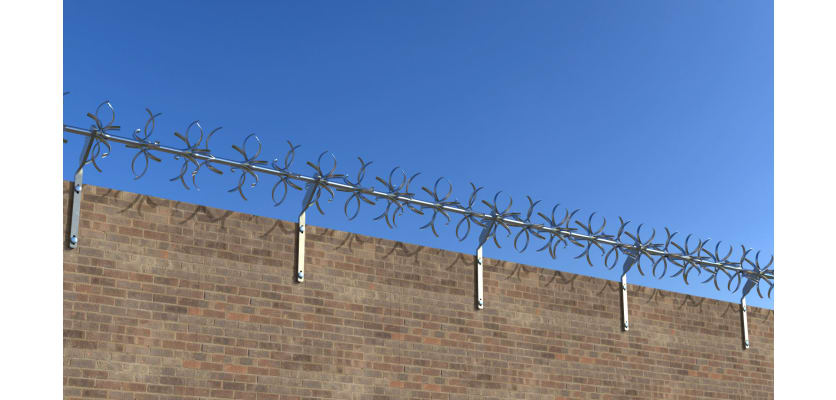 Quadraspike Rotaspike rotating spikes on a wall 