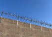 Quadraspike Rotaspike rotating spikes on a wall 