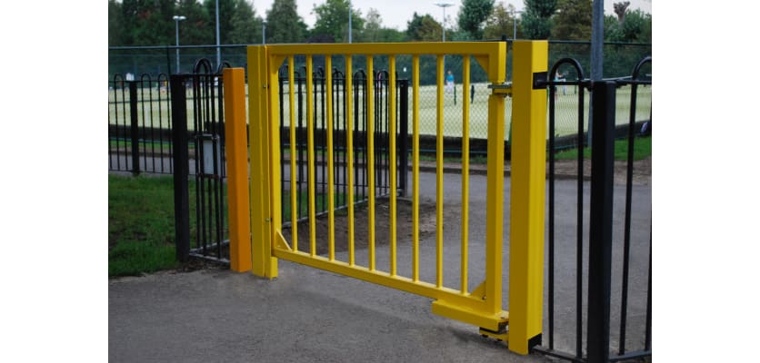 Gate Closer on a Yellow Gate