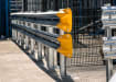 Double beam armco with yellow fish tail ends and bolt down posts