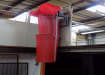 Red 20" rubbish chute installed