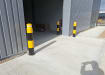 Potted Bollard Installed outside warehouse doors