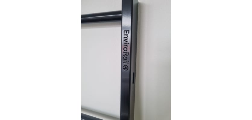 Close up of the EnviroRail Branding on a Black Powder Coated Estate Railing Panel 