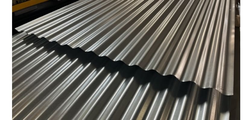Close up of two corrugated metal sheets overlapping each other 