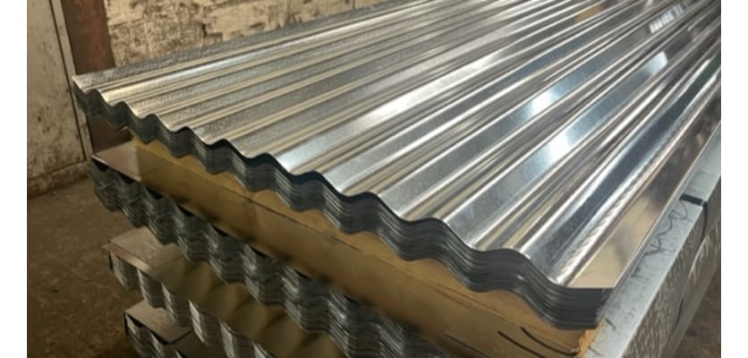 Multiple corrugated metal sheets stacked on top of each other, making them easy to transport and install in large quantities