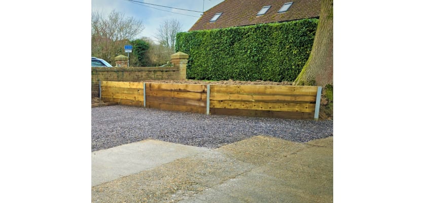 Sleeper retainer wall on driveway