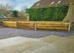Sleeper retainer wall on driveway