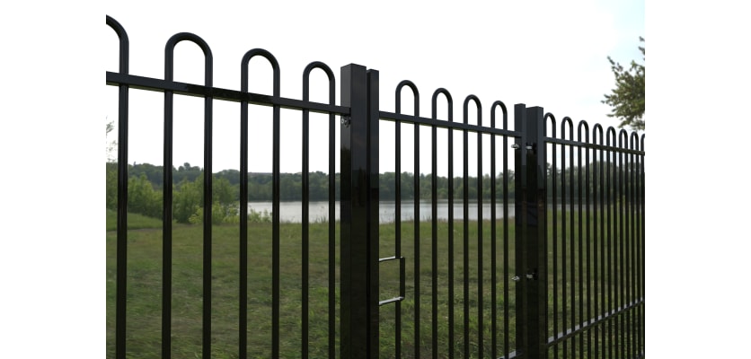 EnviroRail® Bow Top Railing Gate in Black installed in a park