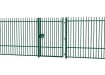 A Green EnviroRail® Vertical Bar Railing Gate installed in row of railings