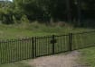 A Black Double Leaf EnviroRail® PlaySec Railing Gate securing a nature reserve