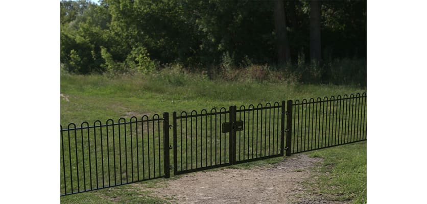 A Black Double Leaf EnviroRail® PlaySec Railing Gate securing a nature reserve