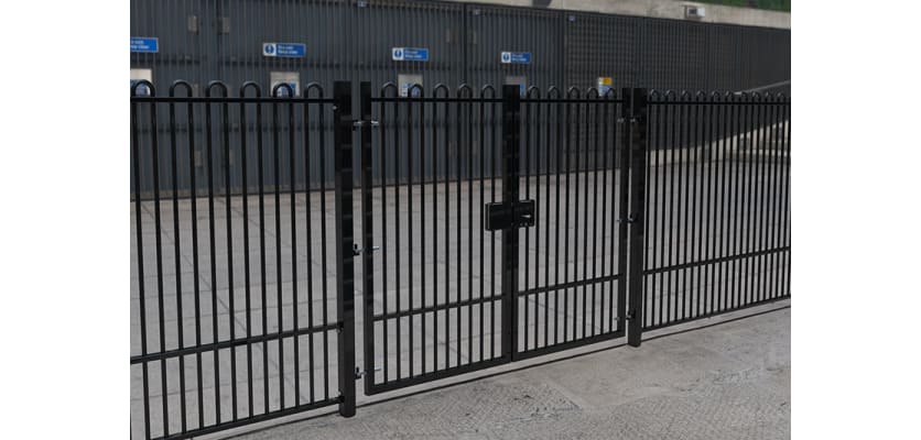 A Black Double Leaf EnviroRail® PlaySec Railing Gate securing a school