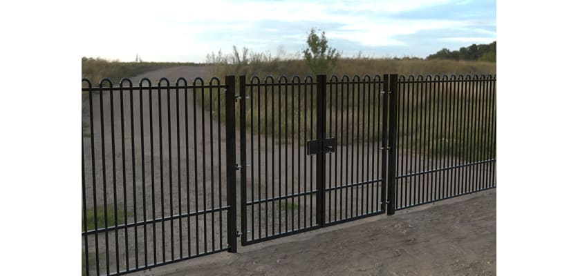 A Black Double Leaf EnviroRail® PlaySec Railing Gate securing a private road 