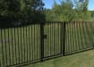 Black EnviroRail® Flat Top Single Leaf Gate Kit installed in park.