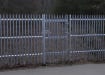 PaliFence® Palisade Security Single Leaf Gate in a perimeter around a private Woodland area