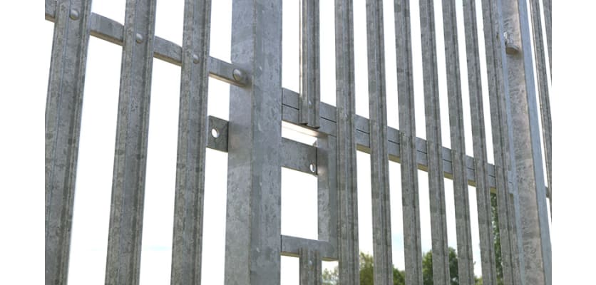 Close up of the sliding latch section of the PaliFence® Palisade Gate installed outdoors 