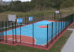 MUGAPlay® Secure 35 Rebound MUGA Kit installed in a grassy field