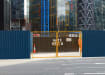 Yellow Site gate installed around building site 