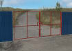 Red Double Leaf Vehicle Site Gate Kit installed around construction site