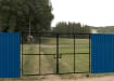 Black Vehicle Site Gate Kit installed around building site