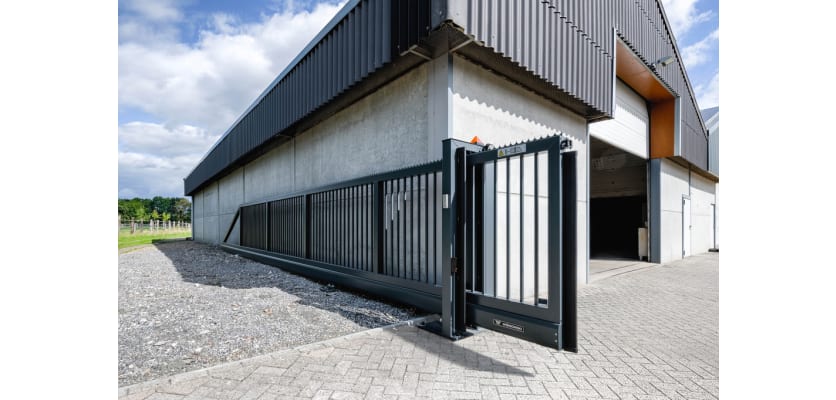 An FFL 95 Manual Cantilever Gate securing a warehouse 