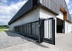 An FFL 95 Manual Cantilever Gate securing a warehouse 