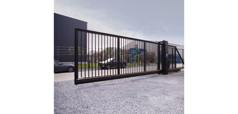 A black FFL 95 Manual Cantilever Gate Securing a Private Carpark