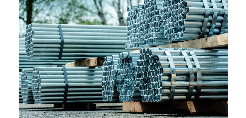 Piled Up Bundles of Steel Scaffolding Tubes 
