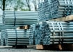 Piled Up Bundles of Steel Scaffolding Tubes 