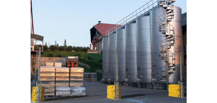 The 2.4m High RapidShield V mesh fencing kit protecting building and industrial equipment 