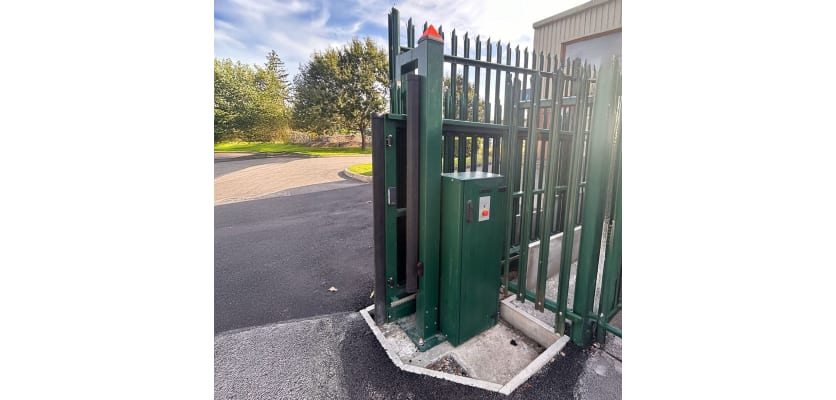 A fully opened FFL 130 Manual Pallisade Cantilever Gate in Green