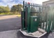 A fully opened FFL 130 Manual Pallisade Cantilever Gate in Green
