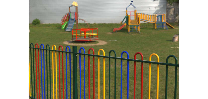 A Close up of the 1.8m High EnviroRail Bow Top Play Sec Railings with Multicoloured Finish