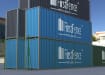 Green chain link installed around storage container 